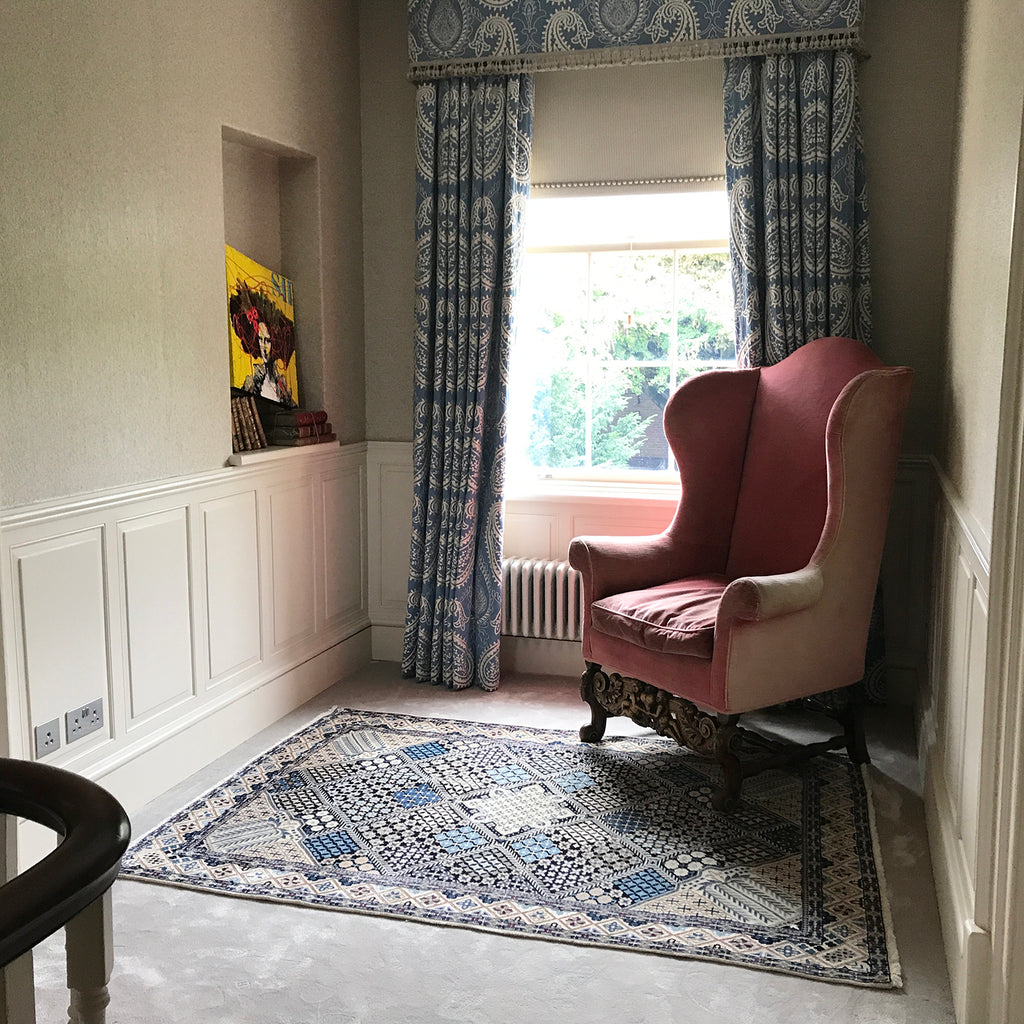 A classic wool and silk Persian Nain rug from The Handmade Rug Company