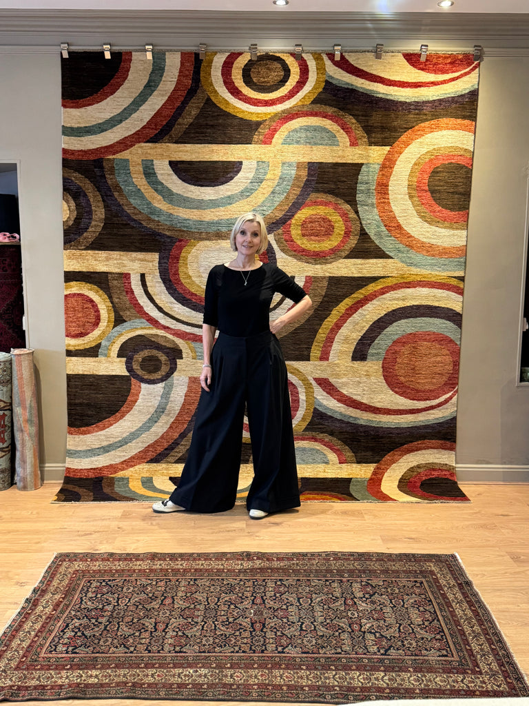 ORPHISM is part of our contemporary collection. Made from the finest hand-spun, vegetable-dyed wool, this contemporary rug is from a very limited production by Afghan weavers.