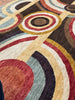 ORPHISM is part of our contemporary collection. Made from the finest hand-spun, vegetable-dyed wool, this contemporary rug is from a very limited production by Afghan weavers.