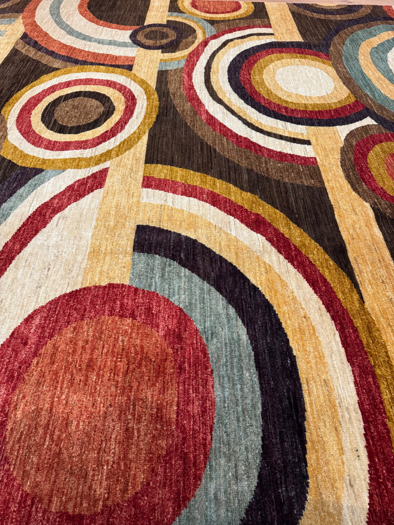 ORPHISM is part of our contemporary collection. Made from the finest hand-spun, vegetable-dyed wool, this contemporary rug is from a very limited production by Afghan weavers.