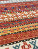Carnival Kilim in Terracotta Red | 407cm x 315cm | Emma Mellor 