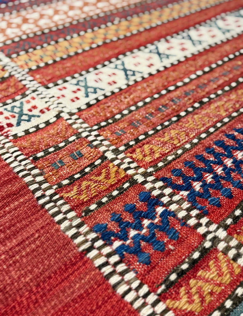 Carnival Kilim in Terracotta Red | 407cm x 315cm | Emma Mellor 