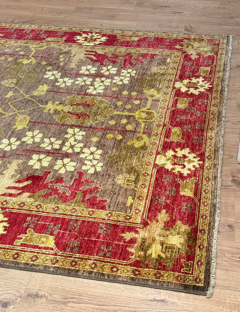 Karakul rug in mouse and raspberry